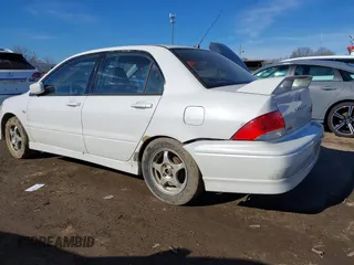 2003 Mitsubishi Lancer OZ-Rally with VIN JA3AJ86E13U100350, listed as a IAAI auction lot 41584874 with 244,945 mi miles. Bid and sale history available at carsss.com. Image 6.