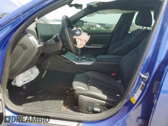 2023 BMW 3 Series 330i with VIN 3MW69FF00P8D04288, listed as a Copart auction lot 57181315 with 35,461 mi miles and Salvage title. Bid and sale history available at DreamBid. Image 7.