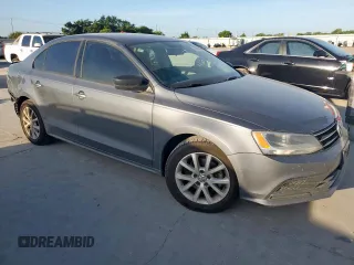 2015 Volkswagen Jetta Sport with VIN 3VWB17AJ0FM281709, listed as a Copart auction lot 62726005 with 169,516 mi miles and Salvage title. Bid and sale history available at DreamBid. Image 4.