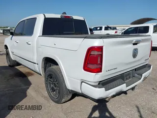 2020 Ram 1500 Limited with VIN 1C6SRFHT8LN190922, listed as a IAAI auction lot 41961670 with 120,100 mi miles and . Bid and sale history available at DreamBid. Image 3.