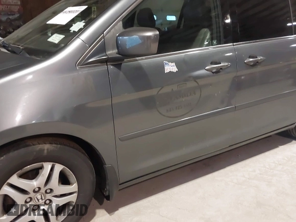 2010 Honda Odyssey EX-L with VIN 5FNRL3H78AB030111, listed as a IAAI auction lot 41250121 with 333,030 mi miles and . Bid and sale history available at DreamBid. Image 15.