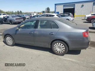 2005 Volkswagen Jetta 2.5L z VIN 3VWRG71K95M619046, wystawiony jako Copart lot #63351685 z przebiegiem 95 052 mil mil oraz Czysty tytuł • Clean title. Historia ofert i sprzedaży dostępna na DreamBid. Obrazek 2.
