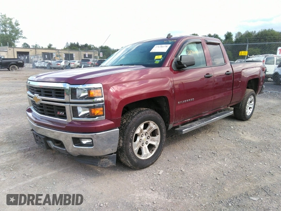 2014 Chevrolet Silverado 1500 LT with VIN 1GCVKREC1EZ220239, listed as a IAAI auction lot 37138278 with 86,715 mi miles and . Bid and sale history available at DreamBid. Image 2.