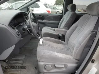 2002 Toyota Sienna LE with VIN 4T3ZF13C72U469151, listed as a Copart auction lot 82419074 with 140,040 mi miles and Salvage Title. Bid and sale history available at carsss.com. Image 7.