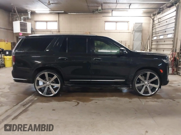 2021 Cadillac Escalade Luxury z VIN 1GYS4AKL7MR295510, wystawiony jako IAAI lot #38398966 z przebiegiem 26 228 mil mil oraz . Historia ofert i sprzedaży dostępna na DreamBid. Obrazek 13.