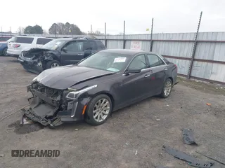 2014 Cadillac CTS Luxury RWD with VIN 1G6AR5S3XE0192441, listed as a IAAI auction lot 41707095 with 205,904 mi miles and . Bid and sale history available at DreamBid. Image 2.