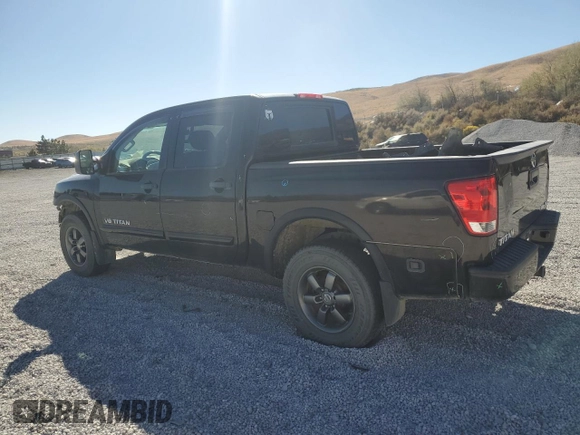 2014 Nissan Titan S with VIN 1N6AA0EC1EN510658, listed as a Copart auction lot 75210054 with Not Provided miles and Salvage Title. Bid and sale history available at DreamBid. Image 2.