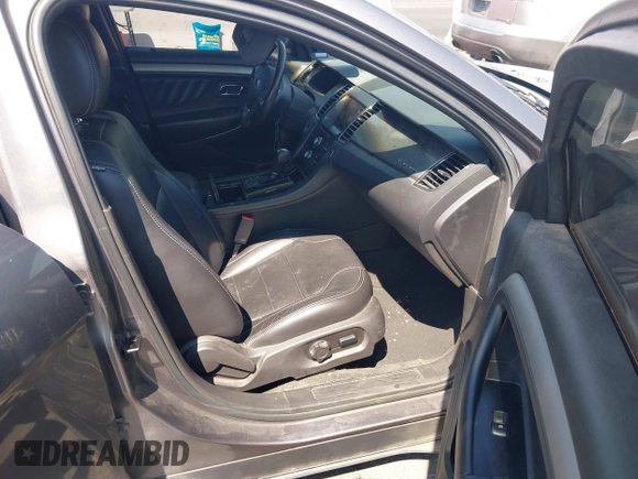 2013 Ford Taurus SEL with VIN 1FAHP2E89DG207904, listed as a IAAI auction lot 42184669 with 147,321 mi miles and . Bid and sale history available at carsss.com. Image 5.