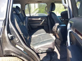 2014 Lexus GX with VIN JTJBM7FX1E5072455, listed as a IAAI auction lot 42133000 with 251,879 mi miles. Bid and sale history available at carsss.com. Image 8.
