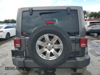 2016 Jeep Wrangler Unlimited 75th Anniversary with VIN 1C4BJWEG3GL216156, listed as a Copart auction lot 62611845 with 87,353 mi miles and Salvage title. Bid and sale history available at DreamBid. Image 6.