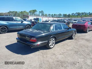 2000 Jaguar XJ with VIN SAJDA15B2YMF14634, listed as a IAAI auction lot 41827953 with 111,505 mi miles and . Bid and sale history available at DreamBid. Image 4.