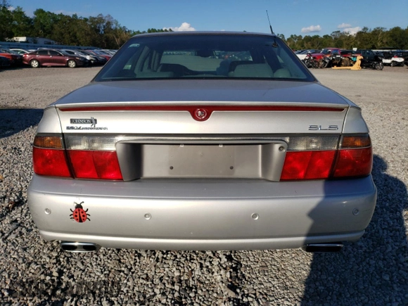 2002 Cadillac Seville Luxury SLS z VIN 1G6KS54Y42U192862, wystawiony jako Copart lot #73684734 z przebiegiem 81 594 mil mil oraz Szkoda całkowita • Salvage title. Historia ofert i sprzedaży dostępna na DreamBid. Obrazek 6.