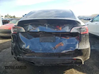 2024 Tesla Model Y Long Range with VIN 7SAYGDEE2RA252101, listed as a Copart auction lot 49514675 with 19,399 mi miles and Salvage Title. Bid and sale history available at DreamBid. Image 6.
