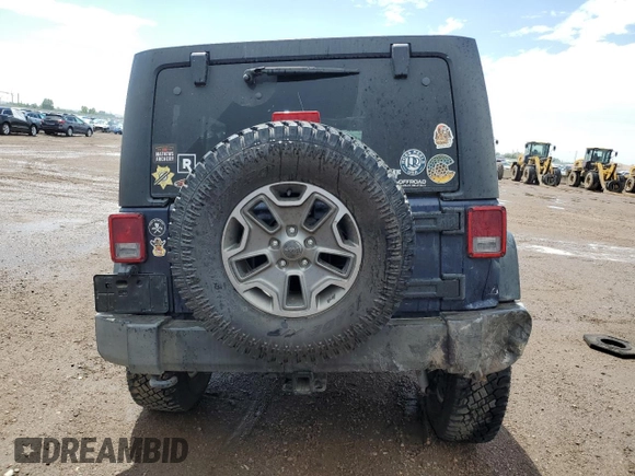 2013 Jeep Wrangler Unlimited Rubicon with VIN 1C4BJWFG5DL572795, listed as a Copart auction lot 62132425 with 149,695 mi miles and Salvage title. Bid and sale history available at DreamBid. Image 6.