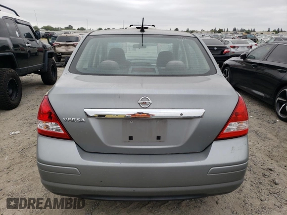 2010 Nissan Versa 1.8 S with VIN 3N1BC1AP2AL405088, listed as a Copart auction lot 53120825 with 116,073 mi miles and Clean Title. Bid and sale history available at carsss.com. Image 6.
