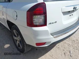 2016 Jeep Compass High Altitude with VIN 1C4NJDEB4GD767731, listed as a IAAI auction lot 41977400 with 99,890 mi miles and . Bid and sale history available at DreamBid. Image 21.