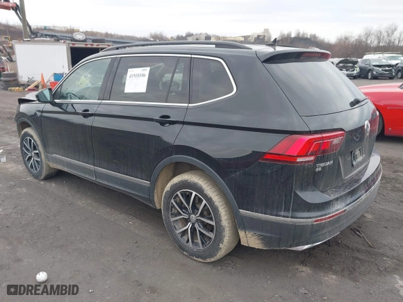 2021 Volkswagen Tiguan SE with VIN 3VV2B7AX0MM049291, listed as a IAAI auction lot 41910106 with 68,468 mi miles. Bid and sale history available at carsss.com. Image 3.
