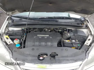 2007 Honda Odyssey EX-L with VIN 5FNRL38787B455417, listed as a IAAI auction lot 42104303 with 214,482 mi miles and . Bid and sale history available at DreamBid. Image 10.