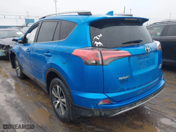 2017 Toyota RAV4 XLE with VIN 2T3RFREV2HW693031, listed as a IAAI auction lot 41671812 with 82,190 mi miles. Bid and sale history available at carsss.com. Image 3.