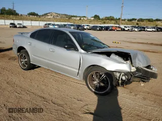 2003 Oldsmobile Alero GL1 z VIN 1G3NL52F43C291875, wystawiony jako Copart lot #74620764 z przebiegiem Nie podano mil oraz Szkoda całkowita • Salvage title. Historia ofert i sprzedaży dostępna na DreamBid. Obrazek 4.