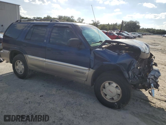 2001 GMC Jimmy SL z VIN 1GKCS13WX12112182, wystawiony jako Copart lot #73460264 z przebiegiem Nie podano mil oraz Nie do naprawy • Non repairable. Historia ofert i sprzedaży dostępna na DreamBid. Obrazek 4.