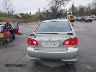 2003 Toyota Corolla CE with VIN 2T1BR32E13C038971, listed as a IAAI auction lot 42027458 with 227,808 mi miles. Bid and sale history available at carsss.com. Image 16.