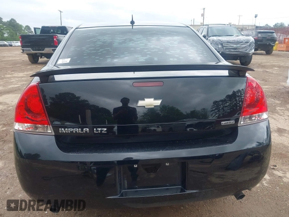 2014 Chevrolet Impala LTZ with VIN 2G1WC5E36E1138809, listed as a IAAI auction lot 41961255 with 119,222 mi miles and . Bid and sale history available at DreamBid. Image 17.
