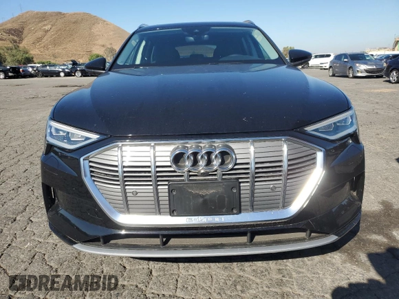 2019 Audi e-tron Premium Plus with VIN WA1LAAGE5KB023079, listed as a Copart auction lot 64977463 with 14,043 mi miles. Bid and sale history available at carsss.com. Image 5.