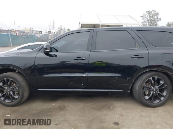 2021 Dodge Durango R/T with VIN 1C4SDHCT5MC660105, listed as a IAAI auction lot 42373172 with 75,227 mi miles and . Bid and sale history available at DreamBid. Image 14.