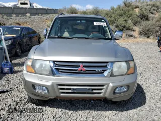 2001 Mitsubishi Montero Limited z VIN JA4MW51RX1J039534, wystawiony jako Copart lot #50329225 z przebiegiem 196 998 mil mil oraz Szkody całkowita. Historia ofert i sprzedaży dostępna na DreamBid. Obrazek 5.