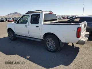 2004 Nissan Frontier XE z VIN 1N6ED27T44C450726, wystawiony jako Copart lot #57004045 z przebiegiem 151 638 mil mil oraz Szkoda całkowita • Salvage title. Historia ofert i sprzedaży dostępna na DreamBid. Obrazek 2.