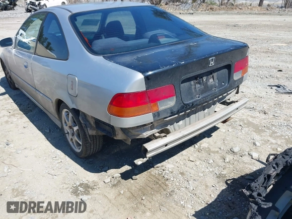 1998 Honda Civic DX with VIN 1HGEJ6123WL130983, listed as a IAAI auction lot 41836867 with 290,461 mi miles. Bid and sale history available at carsss.com. Image 6.