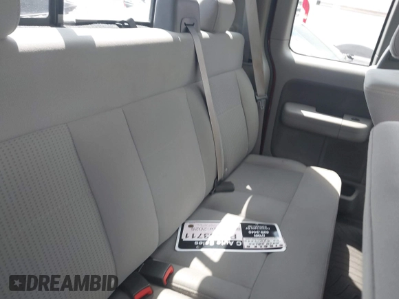 2007 Ford F-150 XLT z VIN 1FTPX14V87FB61659, wystawiony jako IAAI lot #42183080 z przebiegiem 180 988 mil mil oraz . Historia ofert i sprzedaży dostępna na DreamBid. Obrazek 8.
