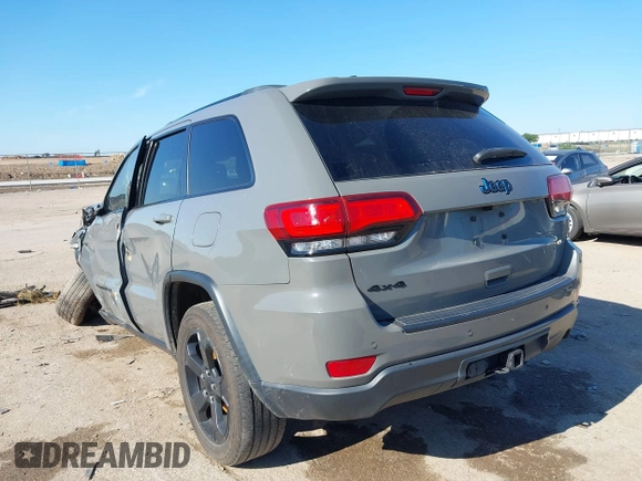 2019 Jeep Grand Cherokee Laredo E with VIN 1C4RJFAG2KC611457, listed as a IAAI auction lot 42212982 with 97,603 mi miles and . Bid and sale history available at DreamBid. Image 3.