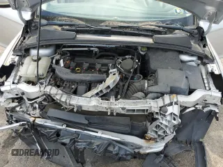 2013 Ford Focus SE z VIN 1FADP3F24DL193495, wystawiony jako Copart lot #57796005 z przebiegiem 178 621 mil mil oraz Tytuł czysty. Historia ofert i sprzedaży dostępna na DreamBid. Obrazek 11.