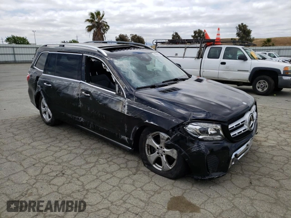 2017 Mercedes-Benz GLS with VIN 4JGDF6EE1HA859753, listed as a Copart auction lot 55002523 with 99,427 mi miles. Bid and sale history available at carsss.com. Image 4.