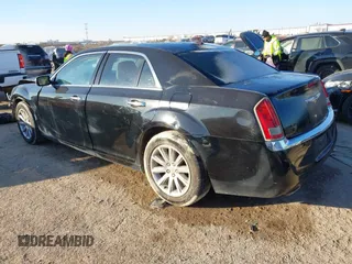 2011 Chrysler 300 Limited with VIN 2C3CA5CG2BH598580, listed as a IAAI auction lot 41330840 with 185,821 mi miles. Bid and sale history available at carsss.com. Image 3.
