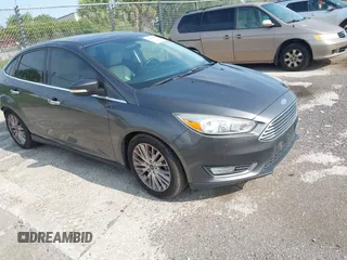 2018 Ford Focus Titanium с VIN 1FADP3J23JL272028, выставлен на аукционе IAAI как лот 42395402 с пробегом 125 975 миль миль и . История ставок и продаж доступна на DreamBid. Изображение 1.