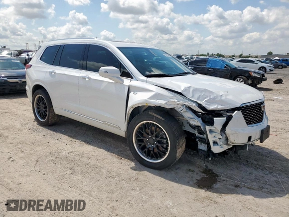 2021 Cadillac XT6 Premium Luxury with VIN 1GYKPDRS5MZ233884, listed as a Copart auction lot 58774595 with 47,490 mi miles and Salvage title. Bid and sale history available at DreamBid. Image 4.