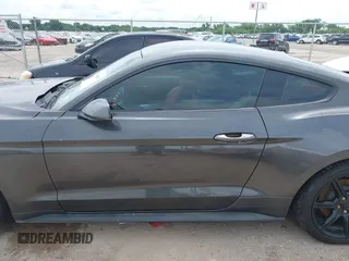 2019 Ford Mustang EcoBoost with VIN 1FA6P8TH6K5106082, listed as a IAAI auction lot 42466881 with 105,323 mi miles and . Bid and sale history available at DreamBid. Image 14.
