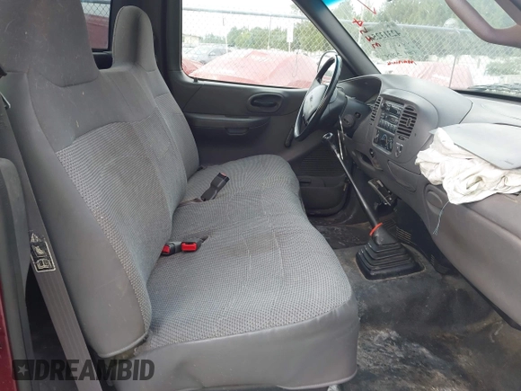 1999 Ford F-150 with VIN 2FTZF1722XCA69178, listed as a IAAI auction lot 42313254 with 197,589 mi miles and . Bid and sale history available at DreamBid. Image 8.