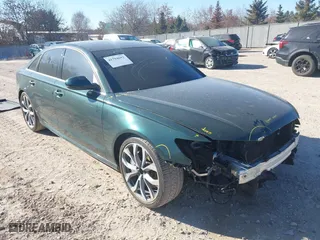 2012 Audi A6 3.0T Prestige with VIN WAUHGAFC8CN160010, listed as a IAAI auction lot 41794692 with 117,897 mi miles. Bid and sale history available at carsss.com. Image 1.