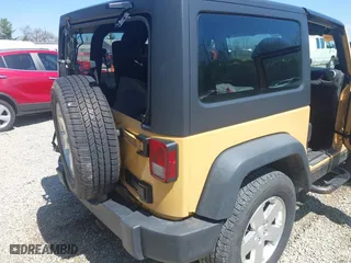2013 Jeep Wrangler Sport with VIN 1C4AJWAG8DL676619, listed as a IAAI auction lot 41942627 with 130,306 mi miles. Bid and sale history available at carsss.com. Image 19.