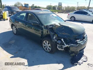 2011 Toyota Camry LE with VIN 4T4BF3EK2BR144228, listed as a IAAI auction lot 41754726 with 124,852 mi miles. Bid and sale history available at carsss.com. Image 1.