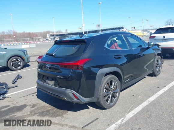 2021 Lexus UX with VIN JTHR9JBH7M2052899, listed as a IAAI auction lot 41878321 with 48,837 mi miles. Bid and sale history available at carsss.com. Image 4.