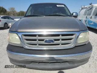 2002 Ford F-150 XLT with VIN 1FTRW07L22KB89313, listed as a Copart auction lot 76680834 with 377,443 mi miles and Salvage Title. Bid and sale history available at DreamBid. Image 5.