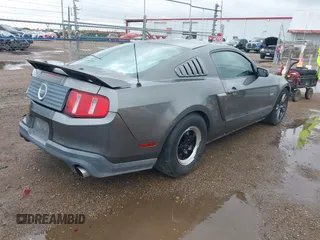 2011 Ford Mustang GT with VIN 1ZVBP8CF8B5148094, listed as a IAAI auction lot 41901160 with 161,658 mi miles. Bid and sale history available at carsss.com. Image 4.