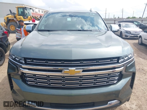 2023 Chevrolet Suburban Premier with VIN 1GNSCFKD6PR393843, listed as a IAAI auction lot 42101935 with 59,604 mi miles. Bid and sale history available at carsss.com. Image 12.