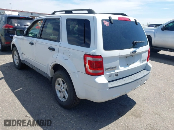 2009 Ford Escape Hybrid with VIN 1FMCU49349KC20129, listed as a IAAI auction lot 42777689 with 171,604 mi miles and . Bid and sale history available at DreamBid. Image 3.