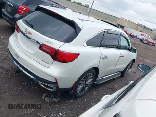 2017 Acura MDX Technology z VIN 5FRYD4H52HB025623, wystawiony jako IAAI lot #42435047 z przebiegiem 63 199 mil mil oraz . Historia ofert i sprzedaży dostępna na DreamBid. Obrazek 4.